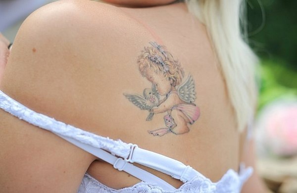 Idées de tatouage créatives 2025-2026 pour les filles - tendances de la mode sur la photo